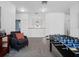 Spacious bonus room featuring an foosball table, with carpeted floors at 3352 Park Grove Ct, Longwood, FL 32779