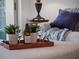 Living room decor featuring a bottle of wine, glasses, plants, and comfortable seating at 3352 Park Grove Ct, Longwood, FL 32779