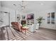 Bright and airy living room with a vaulted ceiling and a cozy fireplace at 3352 Park Grove Ct, Longwood, FL 32779