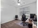 Well-lit office space featuring neutral walls, a large window, comfortable seating, and ample desk space at 3352 Park Grove Ct, Longwood, FL 32779