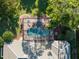 Aerial view of private screened pool and spa area behind home at 3352 Park Grove Ct, Longwood, FL 32779