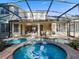 Outdoor living features a beautiful pool and spa area perfect for relaxation and entertainment at 3352 Park Grove Ct, Longwood, FL 32779