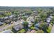 Overhead view of a neighborhood with diverse homes and lush green landscaping at 3714 Paige St, Port Orange, FL 32127