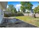 Spacious backyard featuring a well-maintained lawn and a wooden fence for added privacy at 3714 Paige St, Port Orange, FL 32127