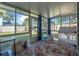 This enclosed sun room offers backyard views and features many kid-friendly toys at 3714 Paige St, Port Orange, FL 32127