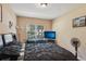 Cozy bedroom with a large window offering plenty of natural light, and desk area at 3721 S Lake Orlando Pkwy # 05, Orlando, FL 32808