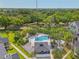 Overhead photo of the community pool surrounded by mature trees at 3721 S Lake Orlando Pkwy # 05, Orlando, FL 32808