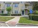 Condominium entrance and accessible parking with lush landscaping including bushes and grass at 3721 S Lake Orlando Pkwy # 05, Orlando, FL 32808