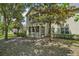 Exterior shot of the home showing the backyard with screened patio at 3721 S Lake Orlando Pkwy # 05, Orlando, FL 32808