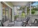 Relaxing screened patio with comfortable seating and views of the outdoor landscape at 3721 S Lake Orlando Pkwy # 05, Orlando, FL 32808