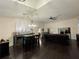 Bright living room features hardwood floors and a dining area, perfect for entertaining at 4297 Abaco Dr, Tavares, FL 32778