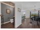 Half bath with decorative ceiling and view to the dining and living areas at 455 Lazio Cir, Debary, FL 32713