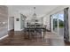 Dining room features a view to the kitchen and sliding glass doors at 455 Lazio Cir, Debary, FL 32713