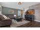 Cozy living room features decorative walls, ceilings and hardwood floors at 455 Lazio Cir, Debary, FL 32713