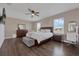 Spacious main bedroom with a ceiling fan and great natural lighting at 455 Lazio Cir, Debary, FL 32713