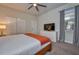 Bright bedroom featuring a ceiling fan, large closet, and a window with natural light at 4807 Kings Castle Cir, Kissimmee, FL 34746
