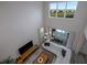 Open concept living room with hardwood floors, a modern chandelier, and large windows at 4807 Kings Castle Cir, Kissimmee, FL 34746
