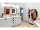 Modern bathroom featuring a double vanity with vessel sinks, stylish fixtures, and ample lighting at 511 E Mirror Lake Dr, Fruitland Park, FL 34731