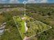 Aerial view of expansive acreage estate, complete with perimeter boundary lines at 5180 Garlanger Trl, Oviedo, FL 32765