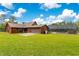 Backyard with covered pool and garage at 5180 Garlanger Trl, Oviedo, FL 32765