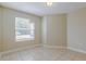 View of the bedroom featuring a window and tile flooring at 5423 Blueberry Dr, Orlando, FL 32811