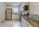 Efficient kitchen with stainless steel appliances and granite countertops at 5423 Blueberry Dr, Orlando, FL 32811