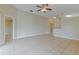 Inviting living room with ceiling fan, tile floors, and spacious layout at 5423 Blueberry Dr, Orlando, FL 32811
