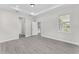 Large bedroom with ample closet space and neutral wall paint at 5438 Brownell St, Orlando, FL 32810