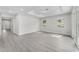 Spacious living room with recessed lighting and light wood floors at 5438 Brownell St, Orlando, FL 32810