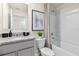 Cozy bathroom with granite counters, shower-tub, and neutral color palette at 550 Zinfandel Dr, Daytona Beach, FL 32117