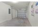 Spacious one car garage with a modern door and clean concrete floors at 552 Zinfandel Dr, Daytona Beach, FL 32117