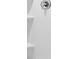 White shower with built-in shelving and chrome fixtures at 552 Zinfandel Dr, Daytona Beach, FL 32117