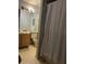 Bathroom featuring a vanity, toilet, and shower with patterned curtain, needing a thorough cleaning at 567 Queensbridge Dr, Lake Mary, FL 32746