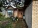 Front entrance to a single-story house with a brick facade and landscaped walkway at 567 Queensbridge Dr, Lake Mary, FL 32746