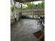 Enclosed patio with tiled floor, seating, and screen walls for outdoor living and enjoyment at 567 Queensbridge Dr, Lake Mary, FL 32746