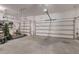Spacious garage with high ceilings and plenty of room for parking and storage at 595 American Holly Pl, Oviedo, FL 32765