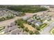 Aerial view of new homes in a suburban neighborhood, featuring modern architecture and well-maintained landscaping at 6543 Orange Cream Aly, Winter Garden, FL 34787