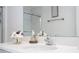 Modern bathroom featuring a sleek sink, chrome fixtures, and fresh decor creates a clean and inviting space at 6543 Orange Cream Aly, Winter Garden, FL 34787