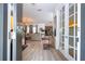 Inviting entryway with wood-look flooring and seamless flow to living spaces at 6543 Orange Cream Aly, Winter Garden, FL 34787