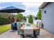 Charming patio area with a dining set and serene outdoor space at 6543 Orange Cream Aly, Winter Garden, FL 34787