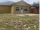 Spacious backyard featuring a patio and a wooden pergola, great for relaxation at 701 Twin Lake Ave, Deltona, FL 32738