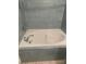 Inviting bathtub with stylish tile surround and modern chrome faucet at 701 Twin Lake Ave, Deltona, FL 32738