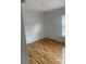 Bedroom with laminate flooring and window at 701 Twin Lake Ave, Deltona, FL 32738