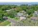 Aerial view of the property showcasing the home's layout, landscaping, and neighborhood surroundings at 711 Valencia Ct, Winter Garden, FL 34787