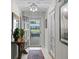 Welcoming foyer with decorative accents and a view into the home at 711 Valencia Ct, Winter Garden, FL 34787