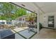 Inviting covered patio with stylish furniture, perfect for outdoor entertaining and relaxation at 711 Valencia Ct, Winter Garden, FL 34787