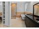 Elegant bathroom featuring a soaking tub and glass-enclosed shower at 7698 Mount Carmel Dr, Orlando, FL 32835