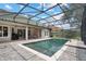 Enjoy this in ground pool with screen enclosure, perfect for summer fun, with a lanai at 7698 Mount Carmel Dr, Orlando, FL 32835