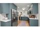Modern kitchen with stainless steel appliances, ample cabinet space, and sleek countertops at 814 Jefferson Ave, Lakeland, FL 33801