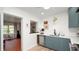 Bright kitchen with white countertops, modern fixtures, and stainless steel appliances at 814 Jefferson Ave, Lakeland, FL 33801